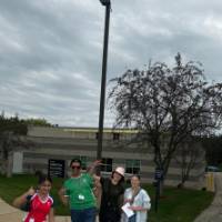 Students posing for a picture on campus at GVSU during orientation (2)